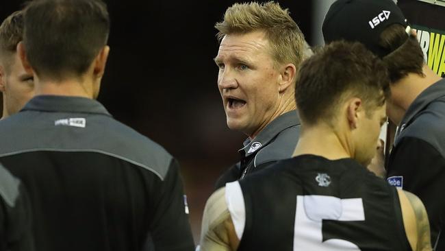 Nathan Buckley talking to his players on Thursday night. Picture: Getty Images.