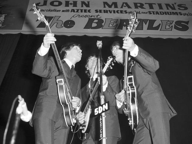 12-06-1964 - The Beatles (L-R)  Paul McCartney, John Lennon & George Harrison perform at Adelaide's Centennial  Hall. This picture appears in the book When We Was Fab: Inside The Beatles Australasian Tour 1964 co-auithored by Greg Armstrong and Andy Neill.