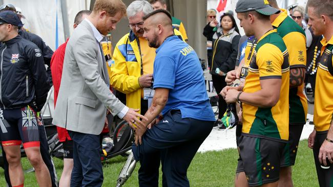 A Ukrainian cycling athlete showed him his prosthetic leg. Picture: Jonathan Ng