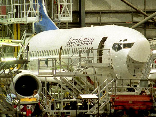 12 Apr 2001 Ansett jet in a hangar at Brisbane Airport picGiulio/Saggin  aviation airlines aircraft grounded