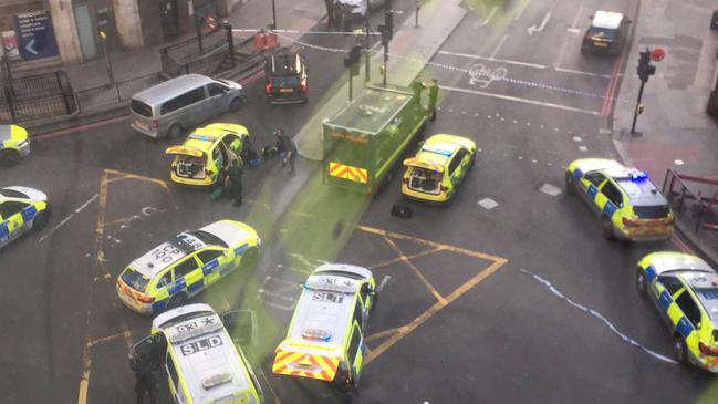 Police and emergency services arriving at Monument tube station following an incident on London Bridge. Picture: Alexandru Ion/AFP