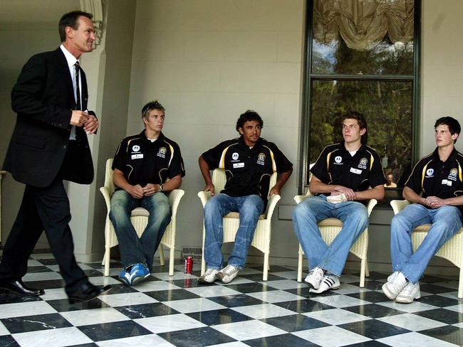 Terry Wallace walks past draftees Brett Deledio, Richard Tambling, Adam Pattison, Danny Meyer and Dean Limbach.