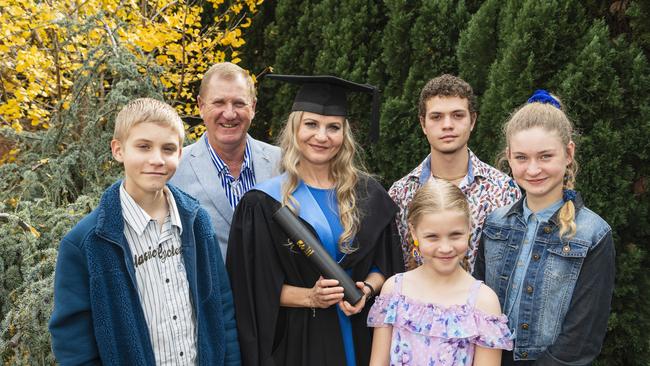 Bachelor of Nursing and Midwifery graduate Anna Kroehn with (from left) Lincoln Kroehn, Mat Kroehn, Krystelle Kroehn, Eduard Lenktis and Maria Kroehn at a UniSQ graduation ceremony at The Empire, Tuesday, June 25, 2024. Picture: Kevin Farmer