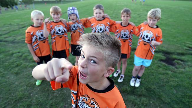 Southport Tigers junior Blake Mozer with teammates (L-R) Holden Hunt, Dane Lehndorf, Jett Winters, Riley Moore, Jack Rowe, Patrick Ramm in 2013.