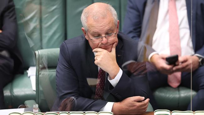 Prime Minister Scott Morrison with a reflection of Anthony Albanese in the screen, during Question Time in the House of Representatives in Parliament House Canberra. Picture: NCA NewsWire / Gary Ramage