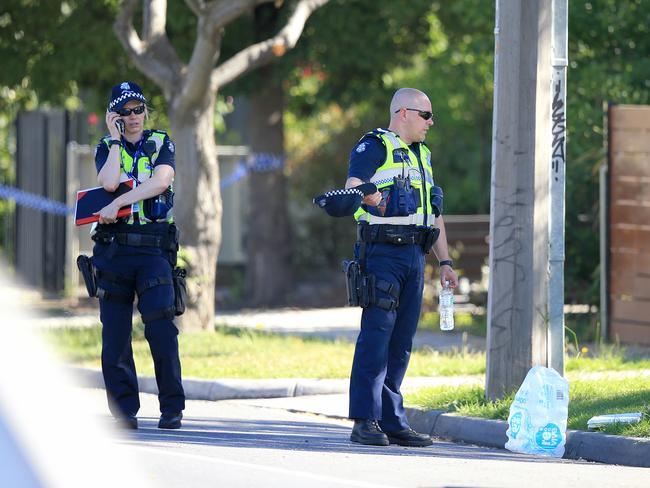 Detectives on the scene of the incident. Picture: Mark Stewart