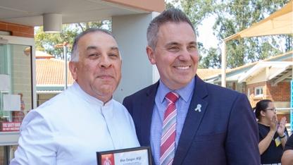 Brother Nicholas Harsas pictured with Fairfield State MP Guy Zangari in 2018.