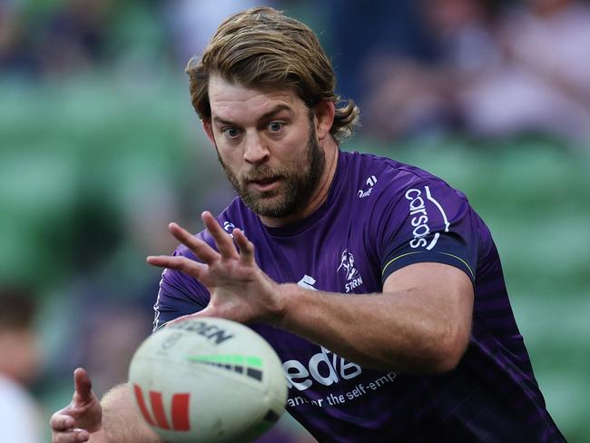 MELBOURNE, AUSTRALIA - AUGUST 24: Christian Welch of the Storm warms up before the round 25 NRL match between Melbourne Storm and Dolphins at AAMI Park, on August 24, 2024, in Melbourne, Australia. (Photo by Daniel Pockett/Getty Images)