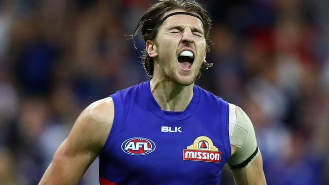 Marcus Bontempelli celebrates a huge final-quarter goal in the 2016 preliminary final.