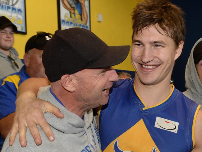 Kyle Martin and Bulls assistant coach Andrew Sharp after a victory.