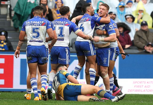 Dylan Napa of the Bulldogs celebrates scoring a try (Photo by Mark Metcalfe/Getty Images)