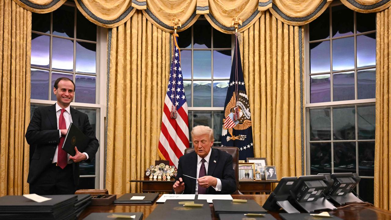 US President Donald Trump inside the newly revamped Oval Office, which still has the gold curtains installed during his first term. Picture: AFP