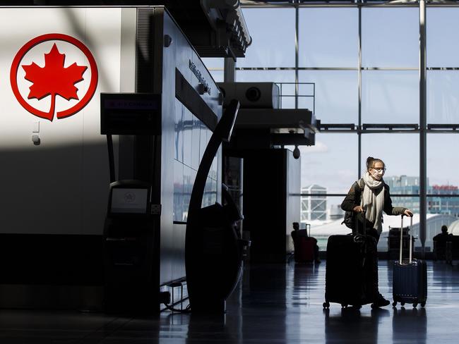 International travellers arriving into Canada will have to go into hotel quarantine. Picture: AFP