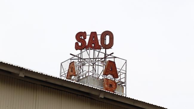 An Arnott’s biscuits sign hangs above the old factory in Strathfield.