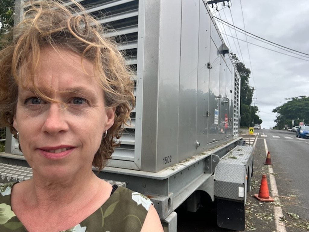 Russell Island resident Trish Harris had no electricity since Thursday and said the telcos needed to work together.