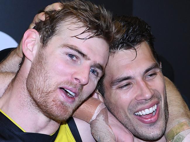 David Astbury (left) and Alex Rance of the Tigers react after the Round 15 AFL match between the Richmond Tigers and the Sydney Swans at Etihad Stadium in Melbourne, Thursday, June 28, 2018. (AAP Image/Julian Smith) NO ARCHIVING, EDITORIAL USE ONLY