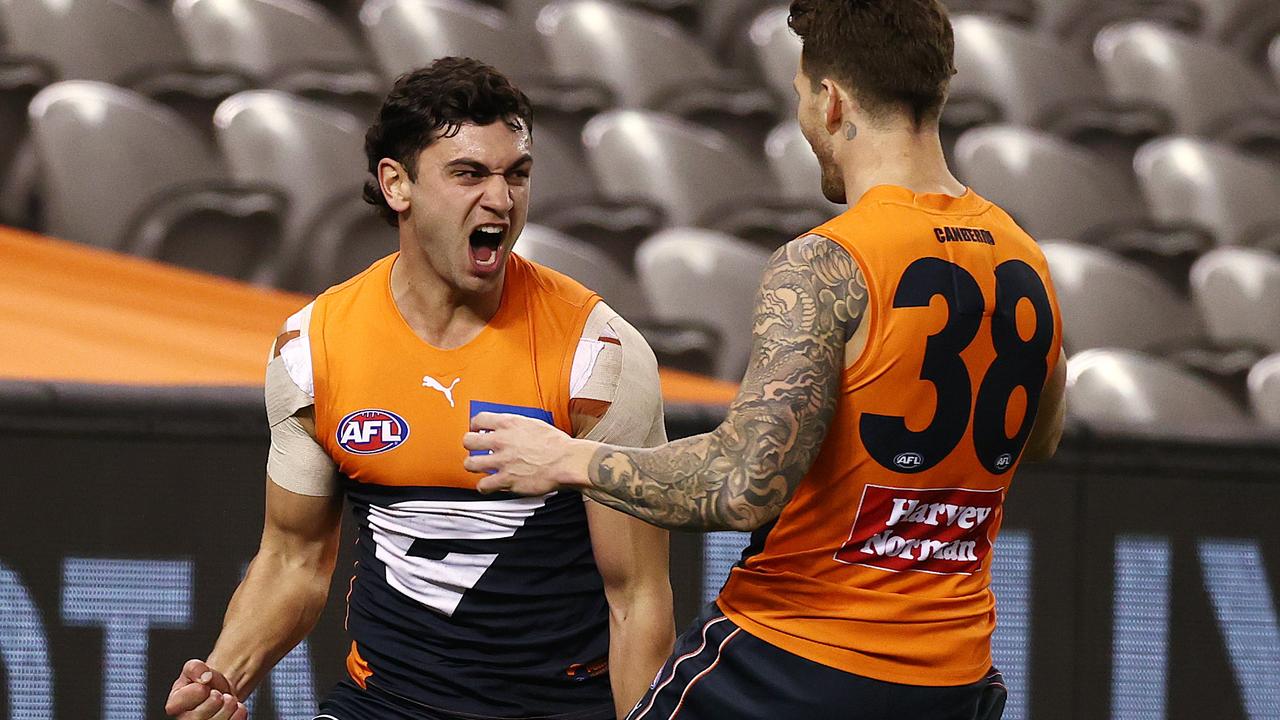Tim Taranto (L) booted four for the Giants on the way to a huge win. Pic: Michael Klein