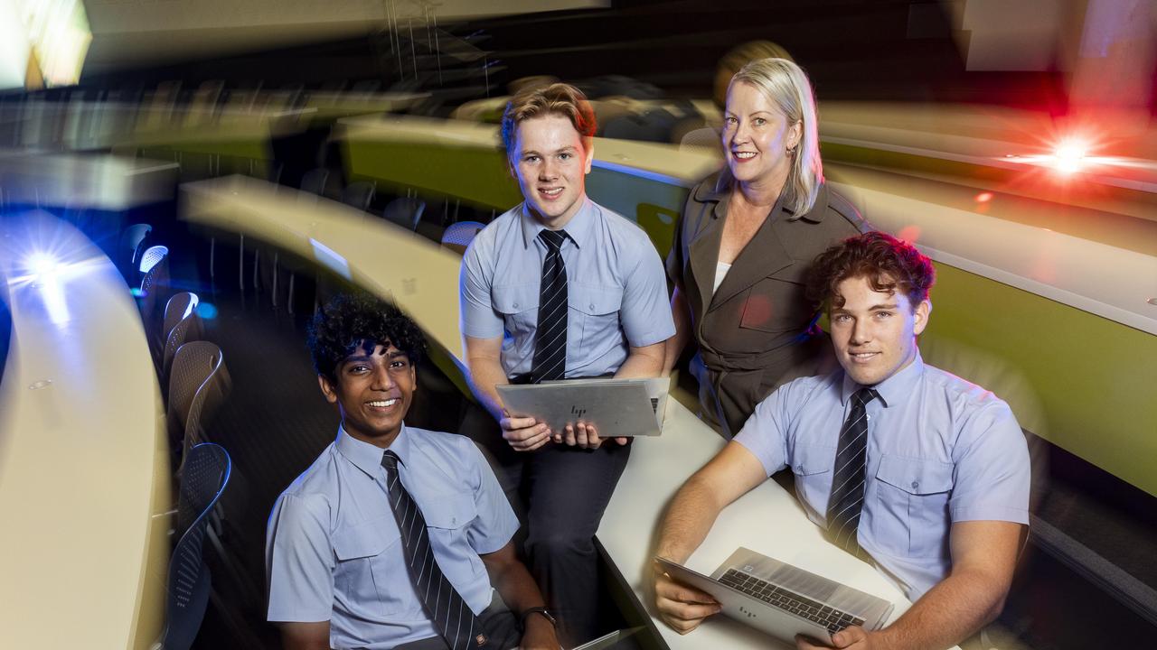 Brisbane Grammar School’s director of STEAM education with students Daham Kodithuwakku, 17, Morgan Jury, 18 and Jonathan Davis, 18. Picture: Matthew Poon