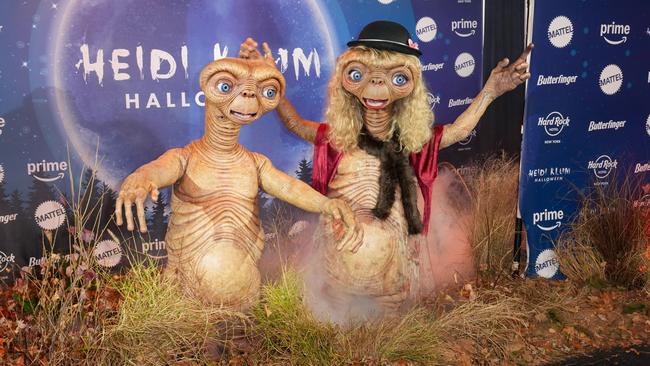 Klum’s husband Tom Kaulitz also dressed as E.T. Picture: John Nacion/WWD via Getty Images)