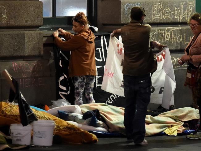 Protest signs were put up at the homeless camp this morning. Picture: Nicole Garmston