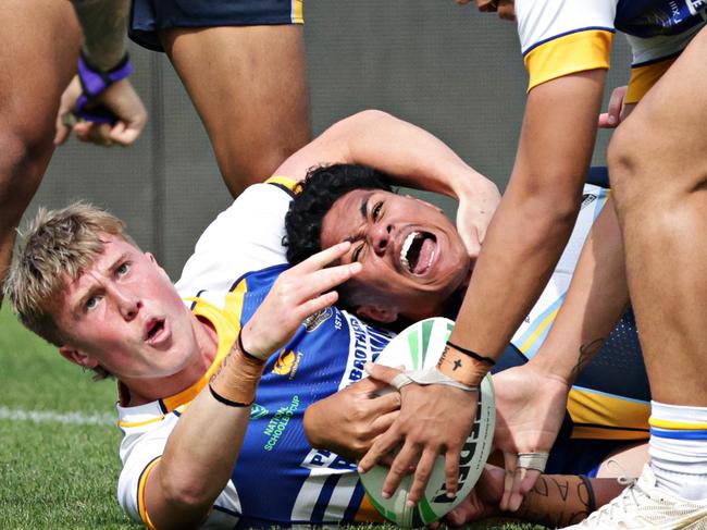 DAILY TELEGRAPH AUGUST 30, 2023. Westfields Sports High player Daniel Waqa scoring a try against Patrician Brothers Blacktown during the final of the Peter Mulholland Cup at Campbelltown Stadium.  Picture: Adam Yip