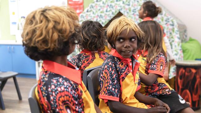 Students at Yipirinya School in Alice Springs participating in a drumming program, playing musical chairs. Picture: Nico Liengme