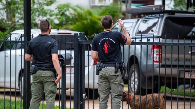 Plain clothes police doorknock around Jingili after a 20-year-old woman was allegedly killed. Picture: Che Chorley