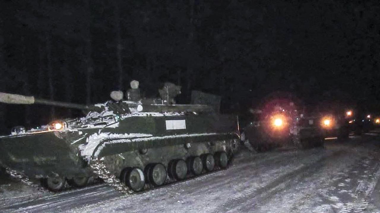 This handout video grab released on January 20, 2022 by Belarus' Defence Ministry, shows Russian infantry fighting vehicles upon their arrival for the joint drills in Belarus. Picture: MINISTRY OF DEFENCE REPUBLIC OF BELARUS / AFP.