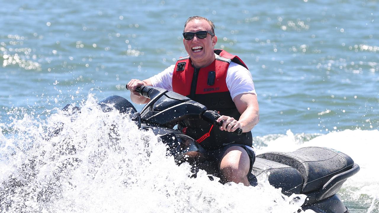 Premier Steven Miles arrives on Jet Ski to Southport on the last day of the Queensland Election campaigning ahead of Saturdays Election Day. Pics Adam Head