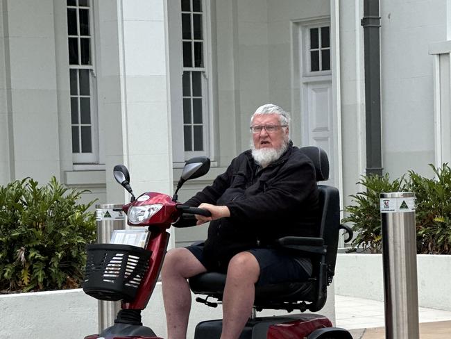 John Francis Kerrigan, 81, parked his mobility scooter next to the bar table where his solicitor and barrister sat in Rockhampton District Court, with special court hearing aids in, as he listened to the court proceedings after pleading guilty to three counts of indecent treatment of a child under 16 on October 9, 2024.