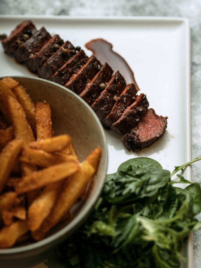 The Bush Inn Brewhouse’s Cape Grim flat iron steak with a side of chunky fries. Picture by ALEX LEE