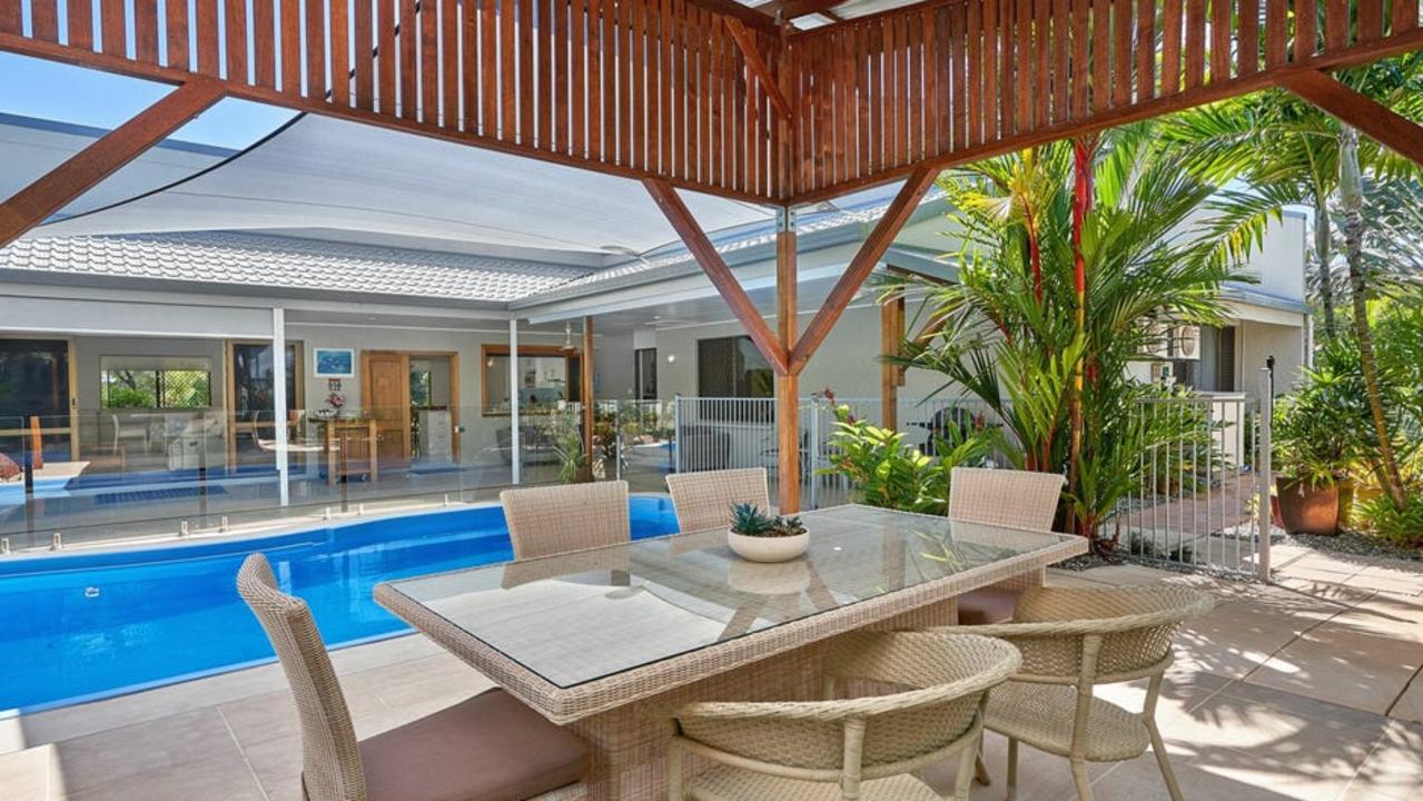 This resort-style house at Clifton Beach is listed for offers in the early $900,000s