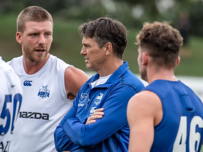 Paul Roos speaks to Aidan Corr at North Melbourne training. Picture: Jason Edwards