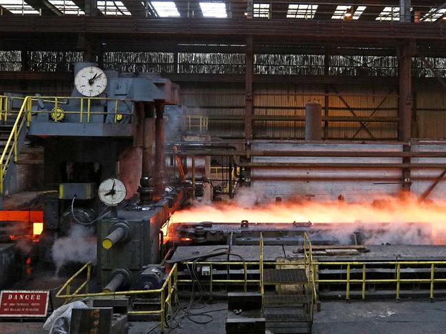 A slab of steel is cooled at Liberty House's rolling steel mill in Newport, U.K. Tata Steel said Monday that it has agreed to sell its specialty steel business in the U.K. to Liberty House. PHOTO: CHRIS RATCLIFFE/BLOOMBERG NEWS