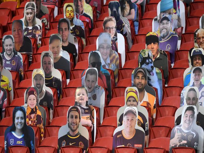 Cardboard cut-outs of fans are seen before the Round 4 NRL match between the Gold Coast Titans and the Wests Tigers at an empty Suncorp Stadium in Brisbane, Sunday, June 7, 2020. (AAP Image/Dan Peled) NO ARCHIVING, EDITORIAL USE ONLY