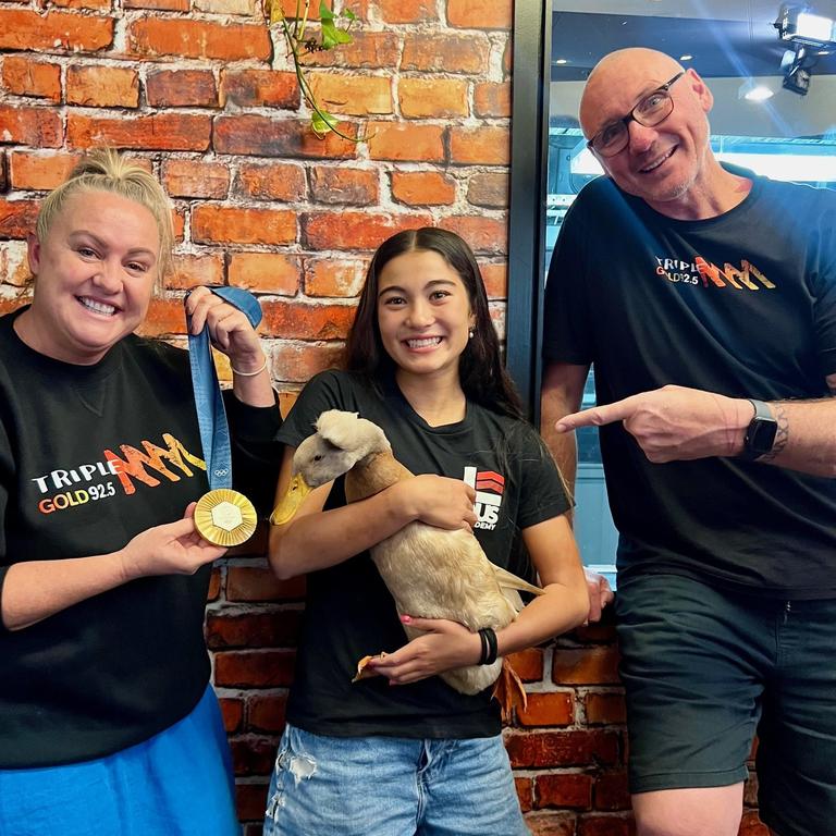 Triple M Gold Coast breakfast presenters surprising Arisa Trew with her new duck.