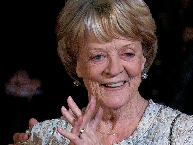 (FILES) A file photo taken on October 15, 2012, shows British actress Maggie Smith on the red carpet as she arrives to attend the premiere of 'Quartet' during the 56th BFI London Film Festival in London. Oscar-winning British actor Maggie Smith, a star of stage and screen for more than seven decades, died in hospital in London on Friday, September 27, her sons announced. (Photo by ANDREW COWIE / AFP)