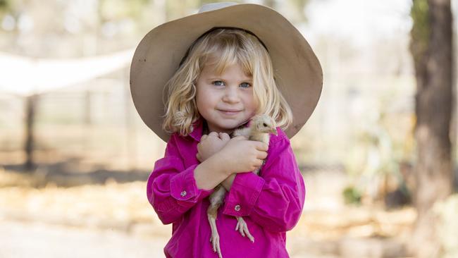 Matilda Uebergang, North Star NSW with her chicken called Brown Blossom. Picture: Kim Storey