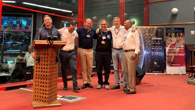 A group shot of OneWeb senior staff with founder Greg Wyler (left) and CEO Adrain Steckel (second from right) taken after the launch of its first satellites in French Guiana in February.