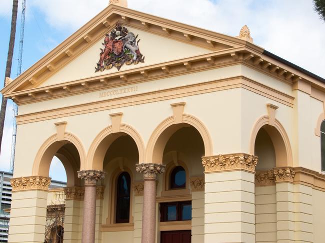 Wayne Raymond Mack covered his face and wept as he was sentenced in the Dubbo District Court. Picture: Jedd Manning