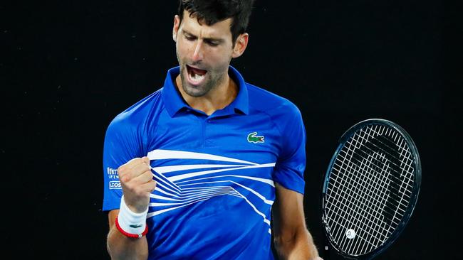 Novak Djokovic reacts after another point against Spain's Rafael Nadal. Picture: David Gray/AFP