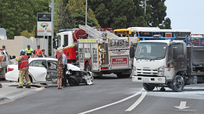 Emergency workers attend a two vehicle crash on Sandy Bay Road out the front of Wrest Point Casino. Picture: LUKE BOWDEN