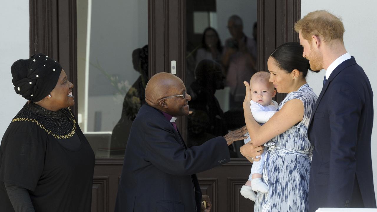 Archie, meeting Desmond Tutu and his wife Leah in Cape Town. Picture: Henk Kruger/Pool via AP