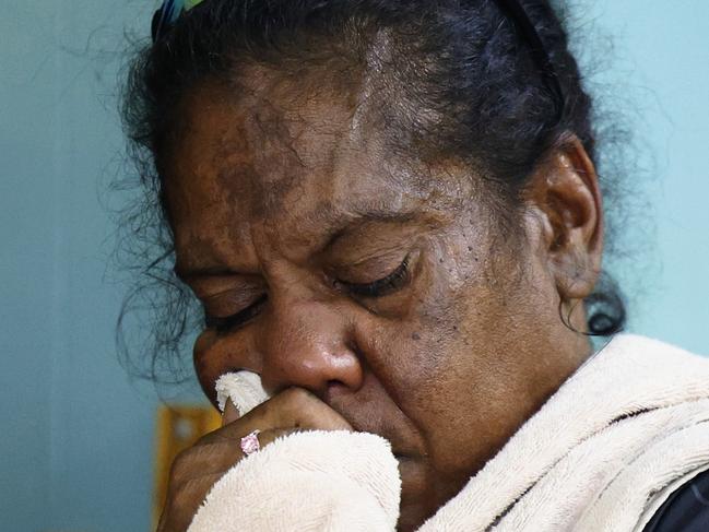 The mother of Aubrey Donahue grieves at a community meeting held at the Mareeba Community Church Fellowship in the wake of his fatal shooting. Picture: Brendan Radke