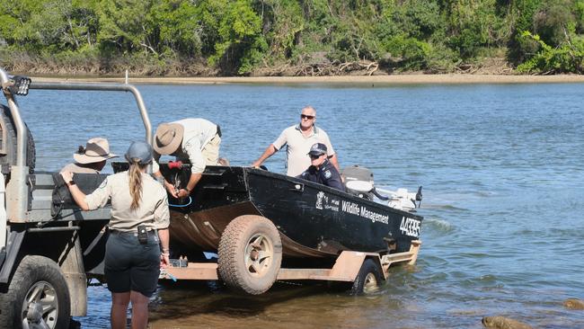 On August 5, 2024 Queensland Parks and Wildlife rangers prepare to retrieve a search boat during the search for a missing man who was taken into the waters of the Annan River by a large croc. Peter Carruthers