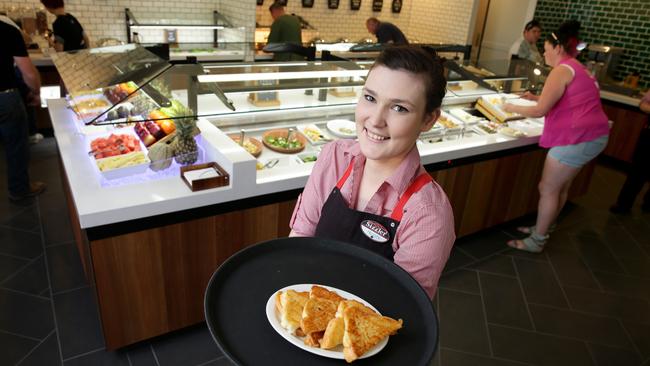 Sizzler at Caboolture will close on November 15. Staff member Felicity Paddison with some cheese toast next to the salad bar. Picture: Chris Higgins