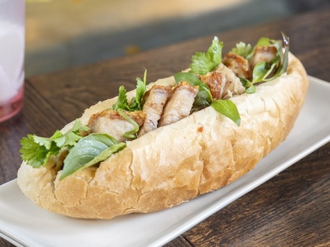 A classic Ly Quan banh mi, which features tasty grilled pork and is dressed with lightly pickled veg. Picture: Supplied
