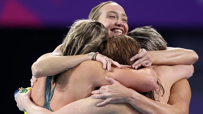 Madison Wilson, Kiah Melverton, Ariarne Titmus and Mollie O'Callaghan celebrate.