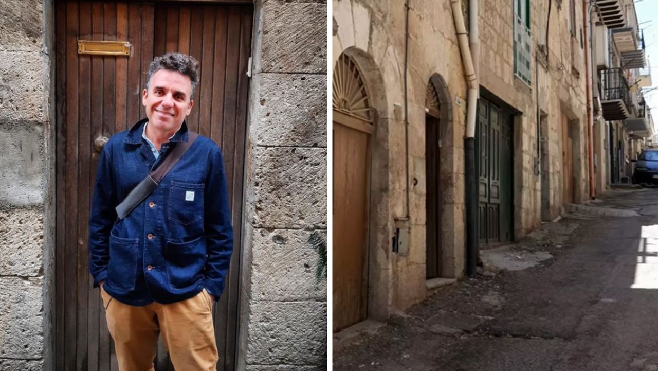 Danny McCubbin standing at the front door of his 1 Euro home in Mussomeli, Sicily. Picture: Danny McCubbin/Instagram/YouTube