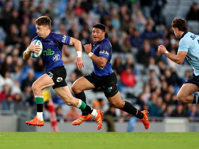 Beauden Barrett charges into space for the Blues. Picture: Getty Images